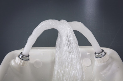 Eye wash station water flow