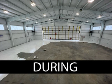 During the Application of White Non Slip coating to concrete.  Notice the easy coverage of a much darker concrete surface.