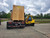 Loading of 3 Crates of 210,000 Gallon Bladder in a crate on a flatbed with forklift