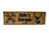 Man cave sign with tools and deer head