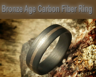 Bronze Age, 7mm wide, Carbon Fiber Ring.