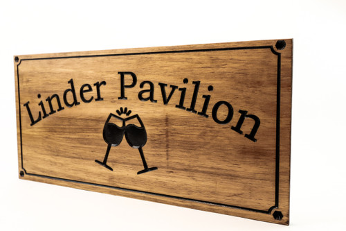 Poolside Pavilion sign with 2 wine glasses