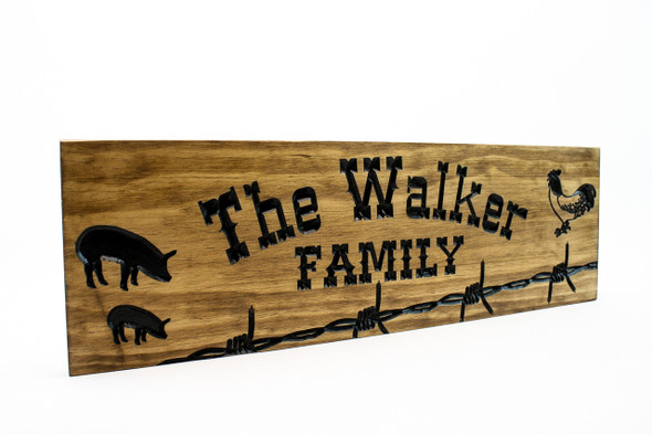Farm/ranch Sign with barb wire and animals Farm/ranch Sign with barb wire and animals