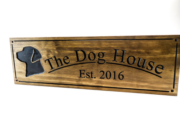 The dog house sign with Labrador 