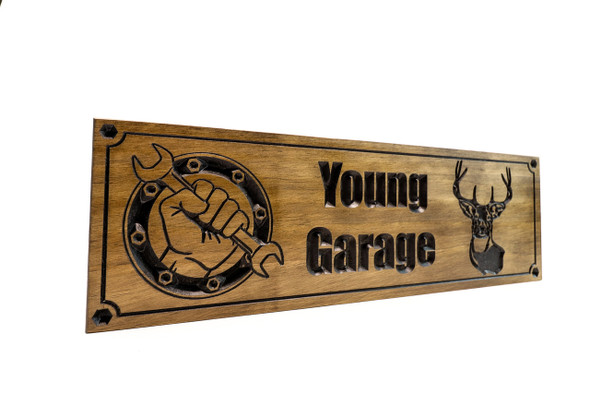 Man cave sign with wrench hand and deer head Man cave sign with wrench hand and deer head