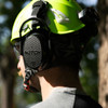 Notch Hook Up ear muffs installed on arborist helmet with Sena Bluetooth