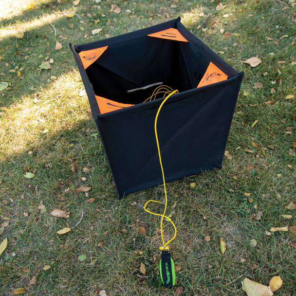 Weaver folding throw line cube in use with arborist line and weight (sold separately)