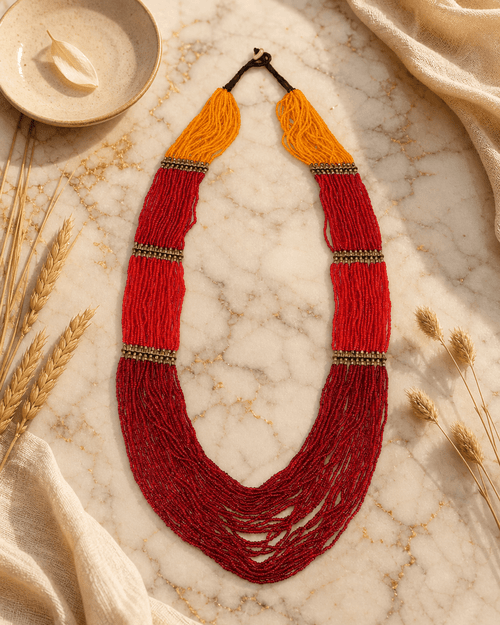 Sunrise Statement Beaded Necklace — necklaces, editorial marble warm lifestyle photo