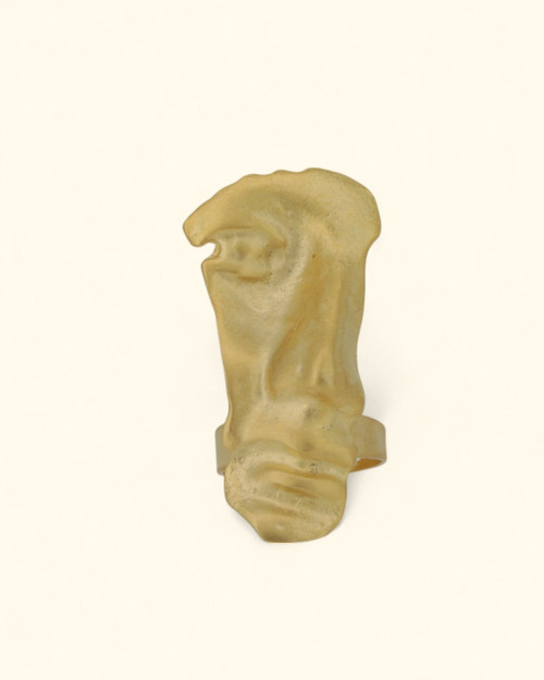 Gold sculptural face ring with abstract design in pewter zinc alloy