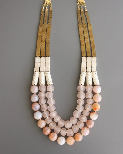 Triple strand fire agate necklace with magnesite and brass