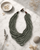 Layered Coconut Bead Necklace in Neutral Tones — necklaces, editorial marble lifestyle photo