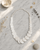 Wood Disk Cascade Necklace — necklaces, editorial marble lifestyle photo
