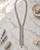Swirly Circle Y-Shaped Necklace — necklaces, editorial marble lifestyle photo