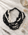 Black and White Layered Necklace — necklaces, editorial marble lifestyle photo