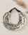 Grey and Cream Layered Necklace — necklaces, editorial plaster shadow lifestyle photo