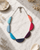 Vibrant Crescent Tagua Necklace — necklaces, editorial marble lifestyle photo