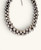 Cultural Elements antique silver-tone layered statement necklace with stacked metal beads and adjustable chain.