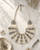 Black and White Geometric Bib Necklace — necklaces, editorial marble lifestyle photo