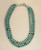 Multi-strand blue wood and brass necklace