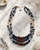 Indigo Wood & Sodalite Necklace — necklaces, editorial marble lifestyle photo
