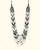 Black and white layered beaded necklace with geometric detail