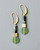 Gold earrings with black emperor stone and olivine glass