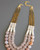 Handmade statement necklace in earthy pinks and neutrals