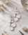 Cascade Textured Disc Drop Earrings — earrings, editorial marble lifestyle photo