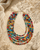 Multi Color Kantha Layered Necklace — necklaces, editorial travertine lifestyle photo