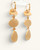 Back view of gold-plated triple stone cat eye drop earrings on display card showing leverback closures and reverse of settings