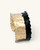 Hand-hammered brass cuff bracelet with black band, side profile view showing full height of gold and black two-tone design