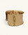 Beaded edge hand-hammered brass cuff bracelet at a three-quarter angle revealing the wide hammered face and beaded side edges