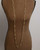 Brass link geometry long wrap necklace as single unlooped strand on dress form, showing full drop length to waist