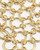 Close-up detail of hand-hammered brass ring bib necklace showing interlocked open brass rings and hammered texture