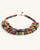 Colorful textile-wrapped bead layered necklace at three-quarter angle, showing bead row depth and gold wire threading