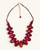 Kantha recycled textile layered bead necklace in red tones, flat lay front view showing two-strand arrangement and gold lobster clasp