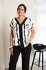ORA Clothing ORS26109 Vee neck print top with contrast neck and front band Off White/Black