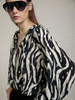 Skatie S95B09BLK Ruffled neckline printed blouse