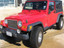 N-Fab J9756U Wheel To Wheel Nerf Steps Gloss Black for 04-06 Jeep Wrangler TJ Unlimited