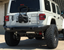 Road Armor 5183R1B Stealth Rear Full Width Bumper with Tire Carrier Hole for 18-26 Jeep Wrangler JL