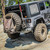 Westin 59-82015 WJ2 Rear Bumper Tire Carrier for 07-18 Jeep Wrangler JK