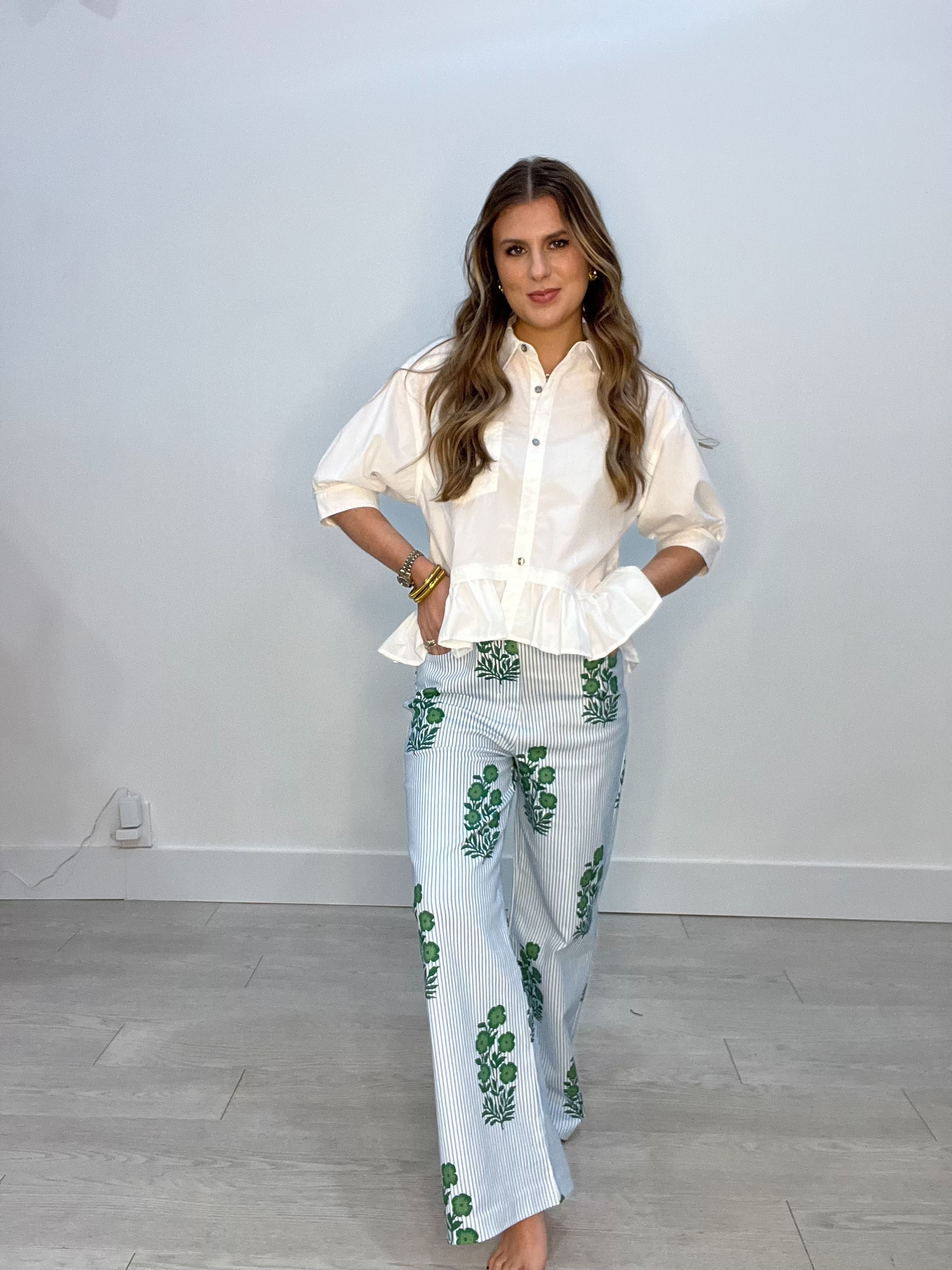 Woman's light blue silk pants with green floral design
