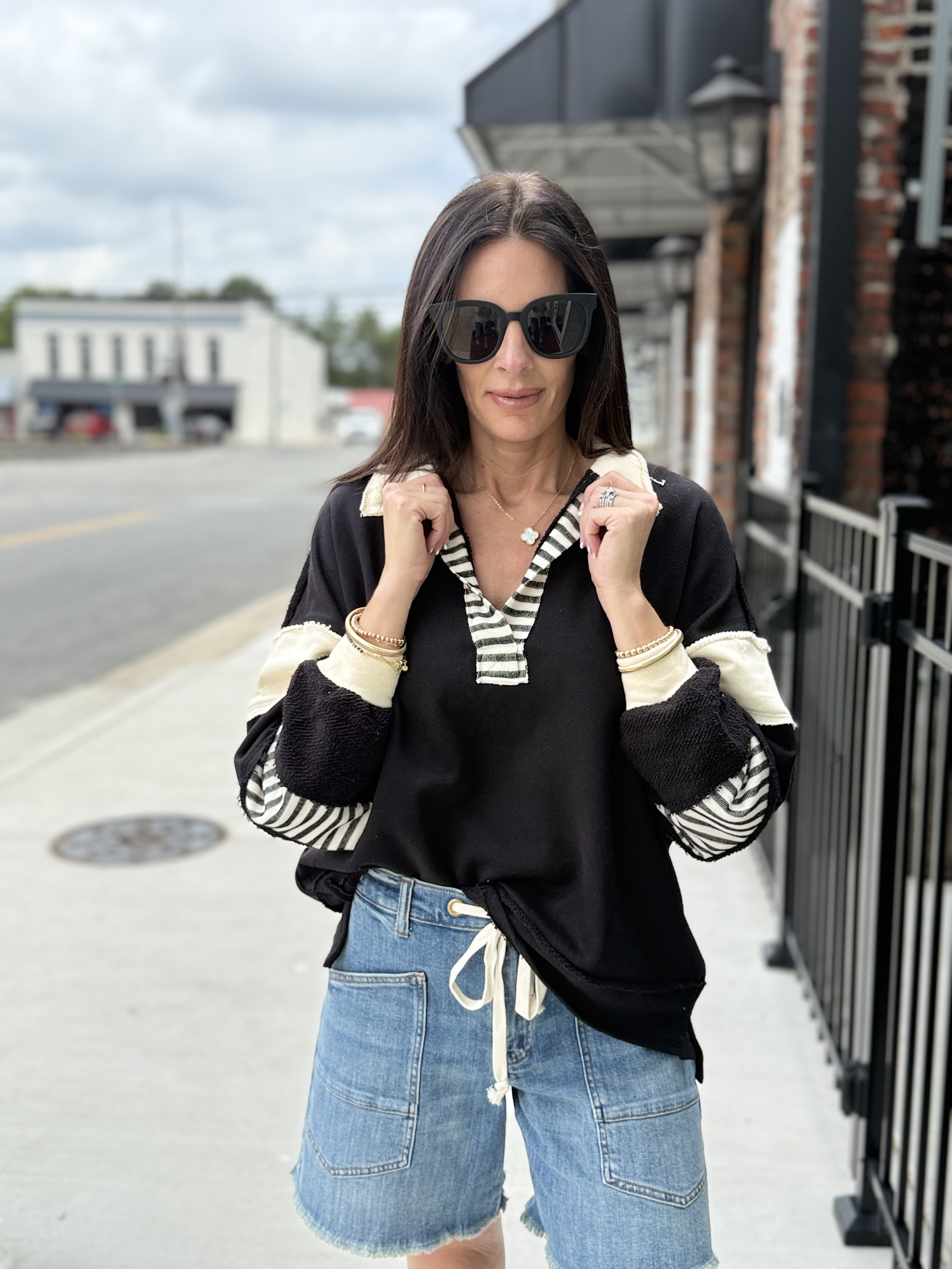 Woman's long bell sleeve shirt in red with embedded design