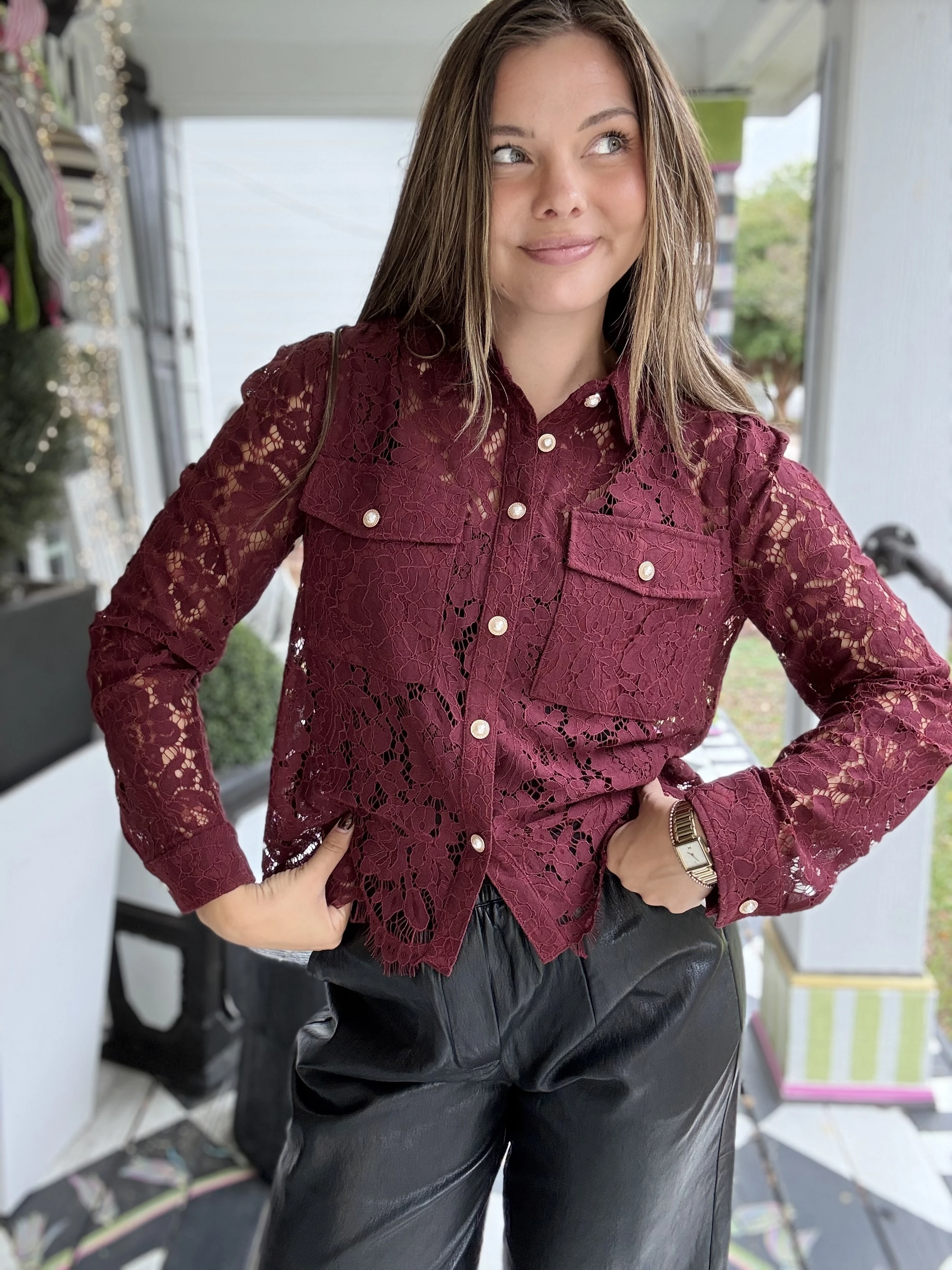 Woman's long bell sleeve shirt in red with embedded design
