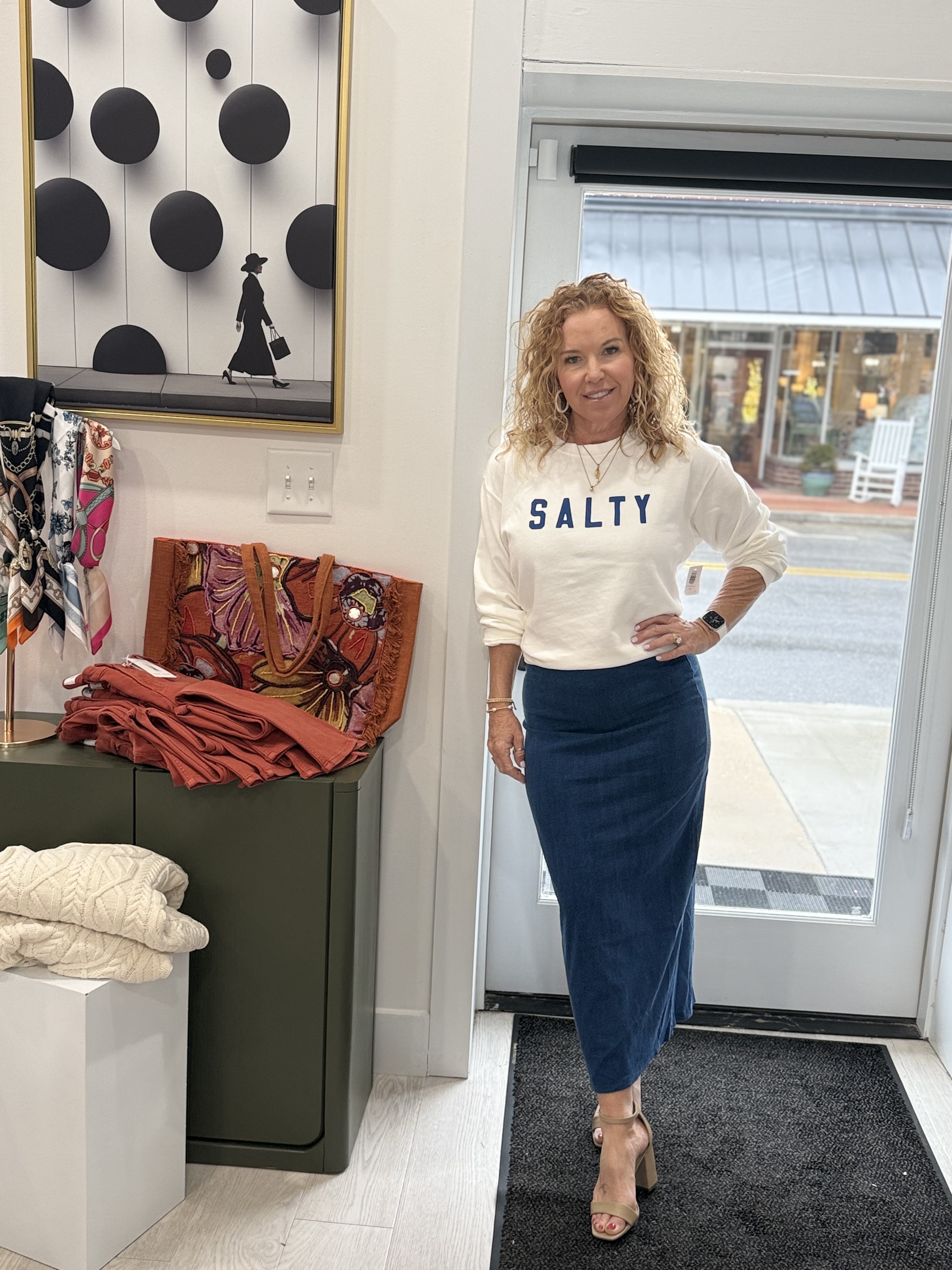 Woman's long bell sleeve shirt in red with embedded design