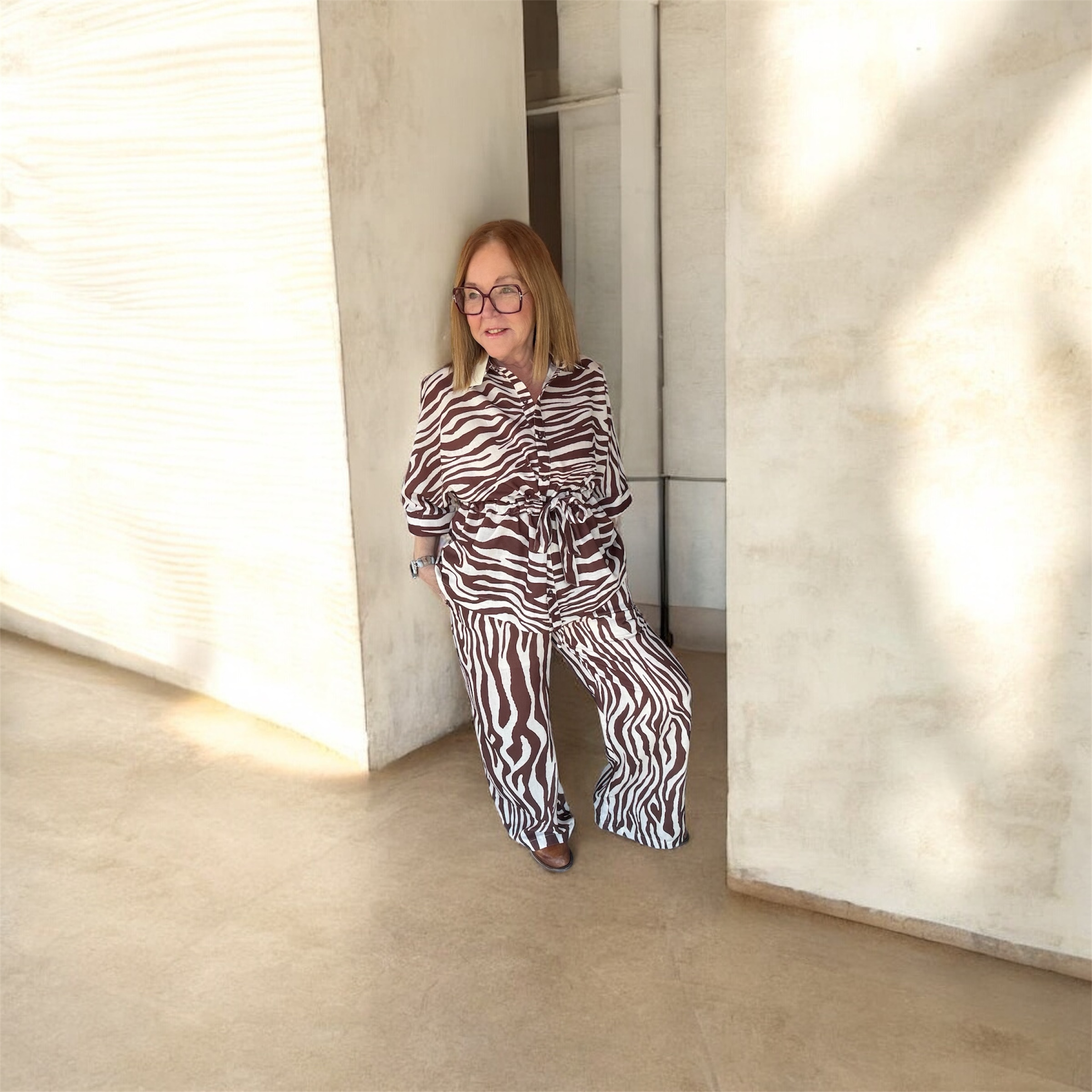 Woman's brown and white zebra print two piece set