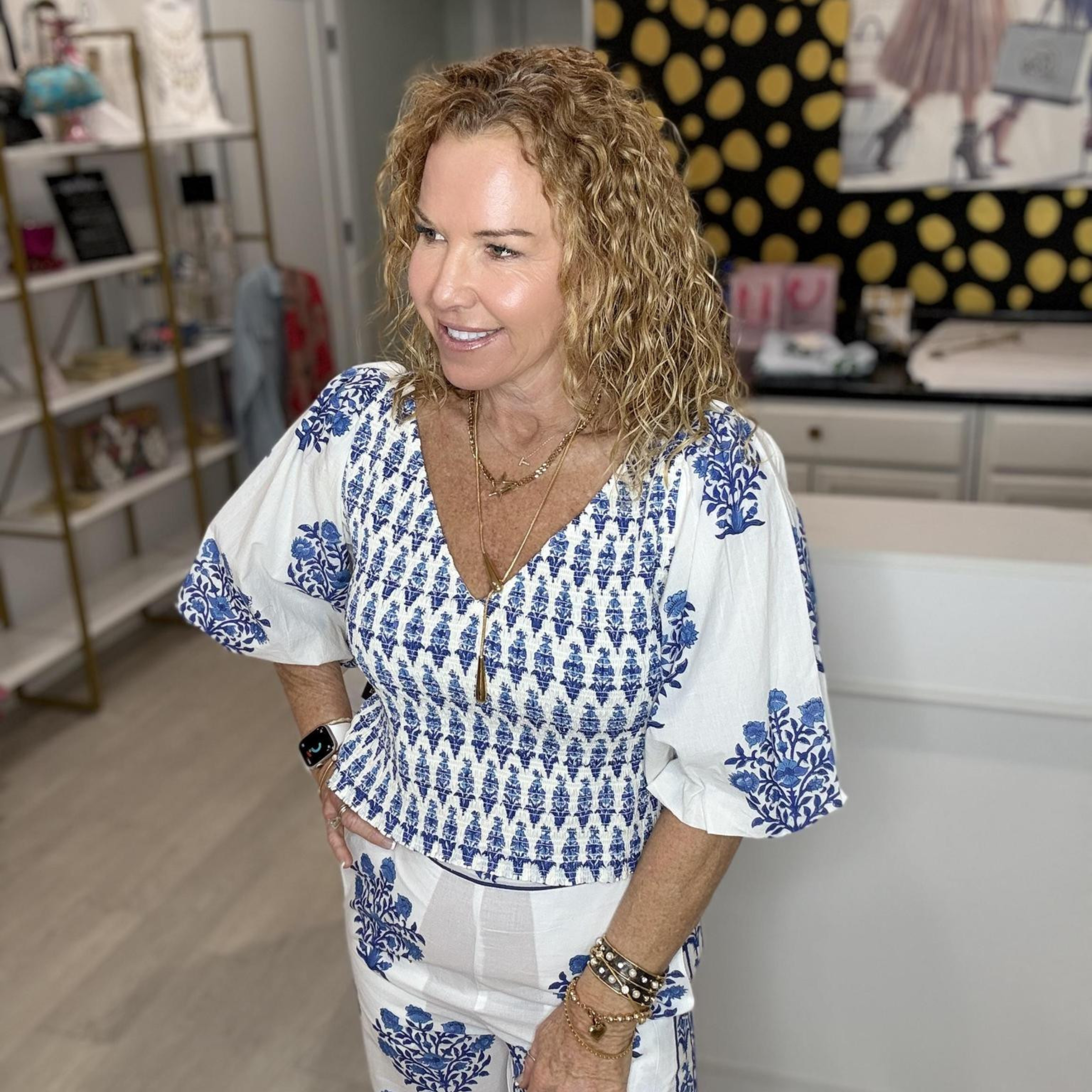 Woman's white and blue floral smocked two-piece set