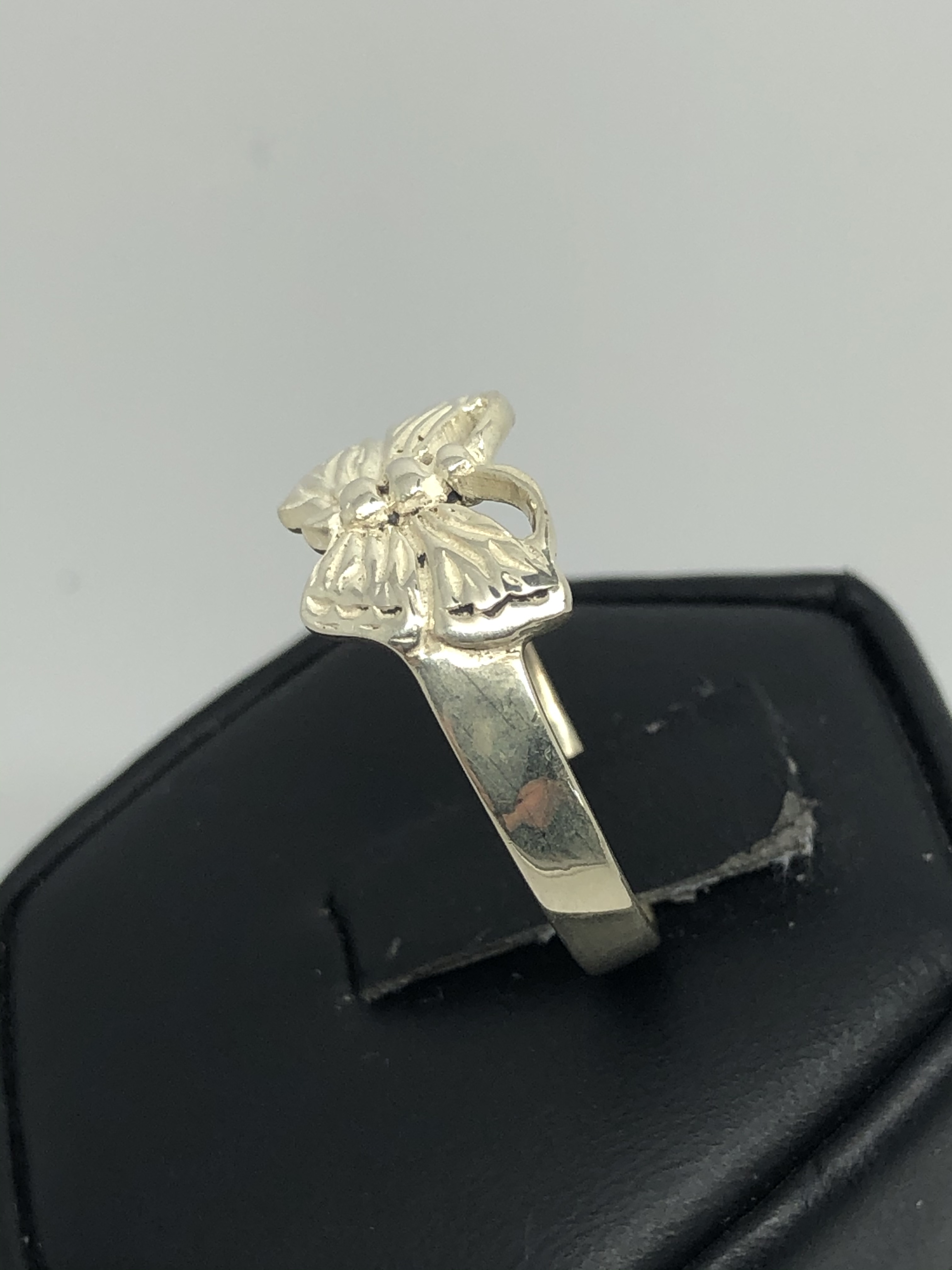 Sterling Silver ring with a butterfly on it. Size 9