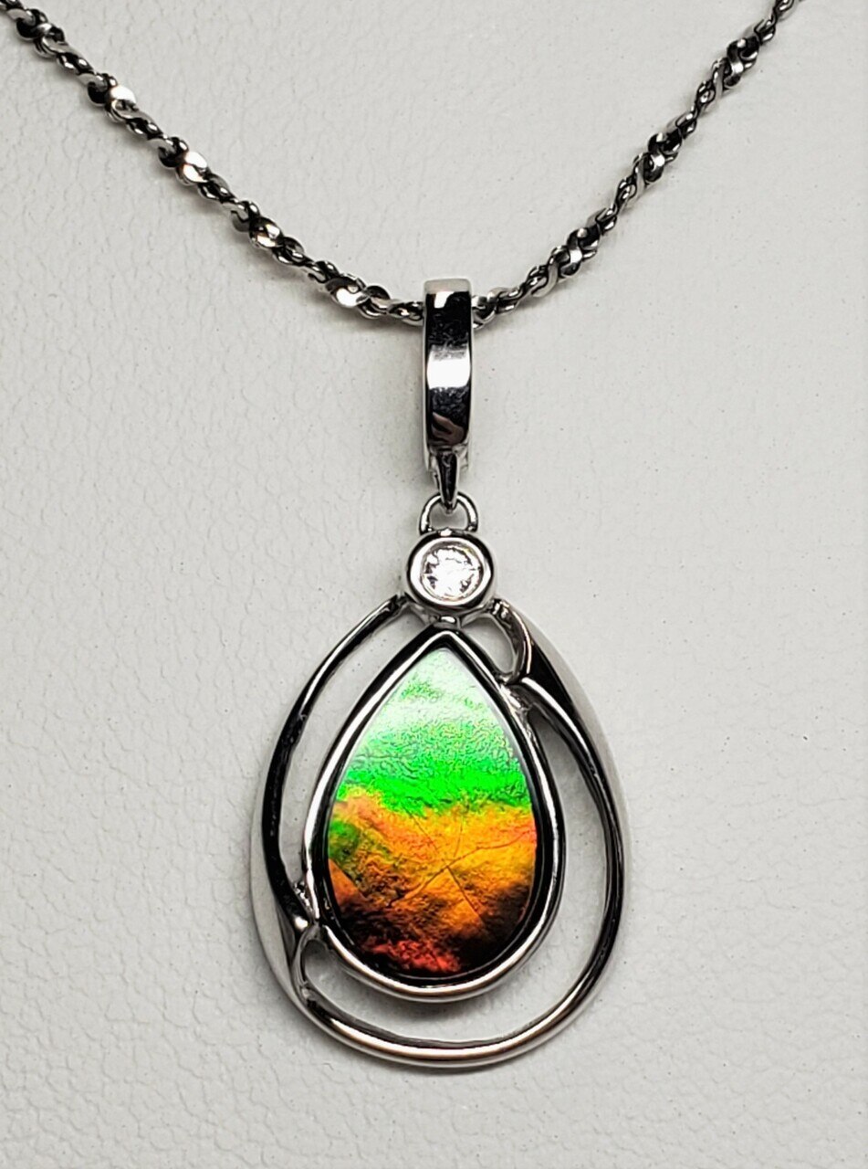 Sterling Silver Tear Drop shaped Ammolite Pendant with a 9 x 13 mm Pear Shaped