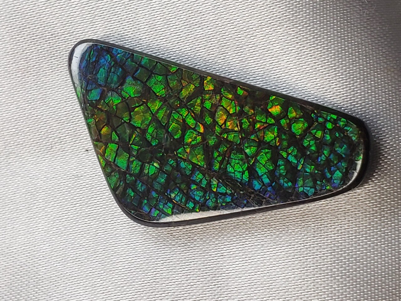 Ammolite Free Form Triangle 36x18 With Yellow and Hints of Deep Blue and Green